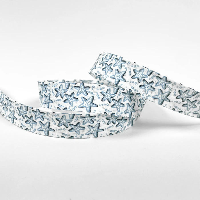Biais replié 20mm blanc motif étoile de mer /m Biais replié 20mm blanc motif étoile de mer /m