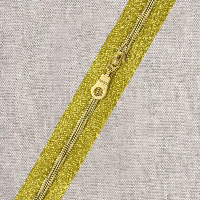 Fermeture spirale métal et curseur or au mètre Fermeture spirale métal et curseur or au mètre