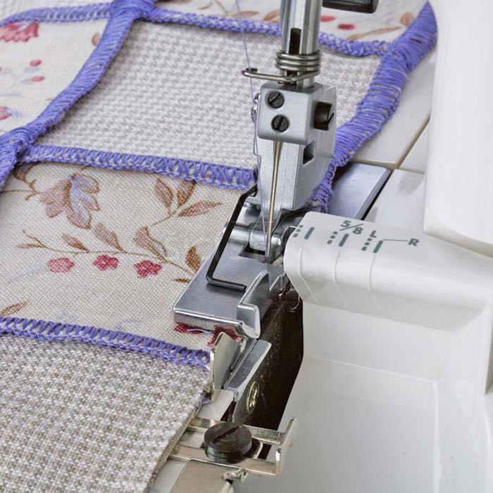 Guide tissu couture gradué pour surjeteuse Janome / Elna Guide tissu couture gradué pour surjeteuse Janome / Elna