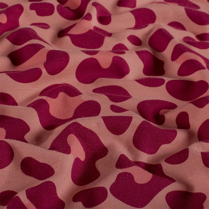 Tissu jersey de coton panthère vieux rose 150cm par 50cm Tissu jersey de coton panthère vieux rose 150cm par 50cm